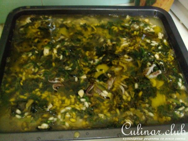 Кальмары,фаршированные шпинатом с рисом